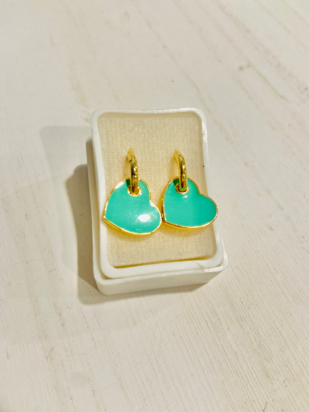 Heart charm earrings